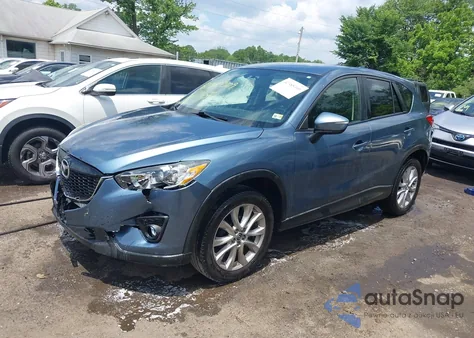 2015 Mazda Cx-5 Grand Touring z USA, uszkodzony, nr VIN JM3KE4DY5F0471689